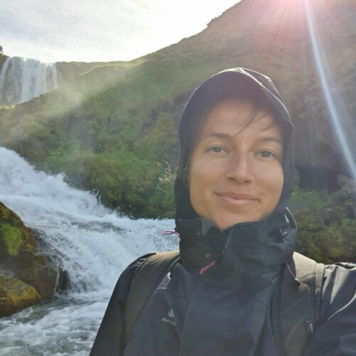 Female traveller Iceland waterfall